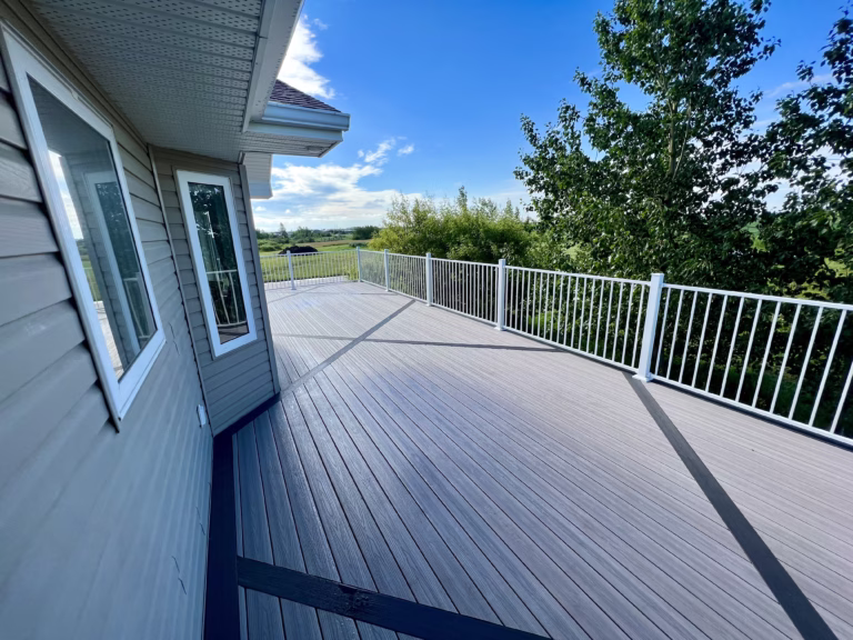 Fiberon composite decking installed with inlay by MN Fence + Deck